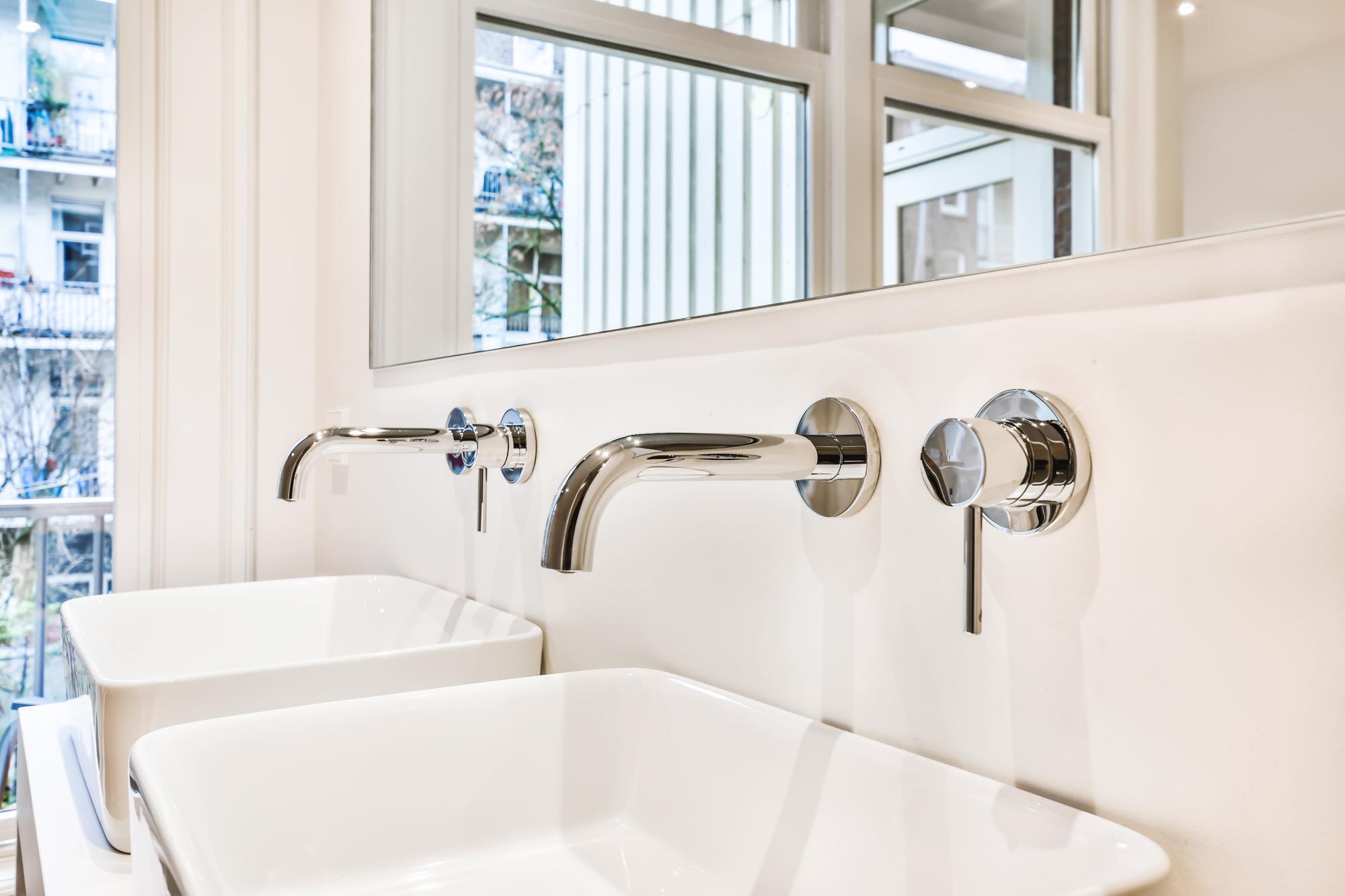 charming-bathroom-with-two-sinks_305343-18934